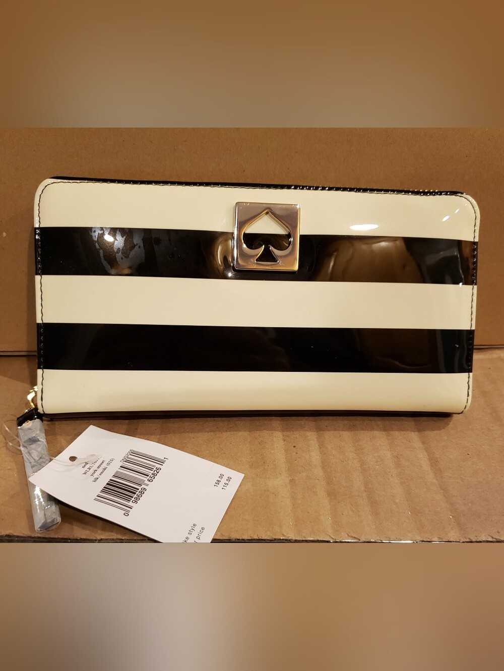Kate spade Black and Cream Patent Stripe Zip Wallet.